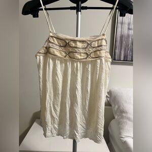 American Eagle Outfitters SMALL
Embroidered Swing Cami top in Cream.